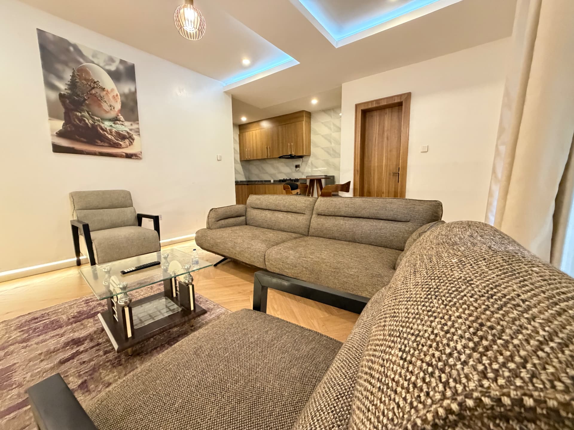Living and dining area of the Aston Gaduwa home leading to the open kitchen
